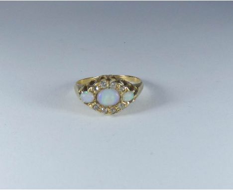 19th century three stone opal and diamond ring on 18ct gold shank, ring size N