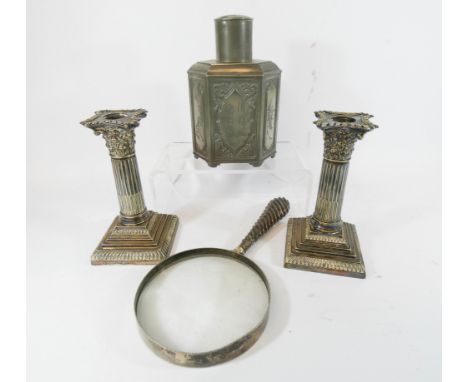 A pair of silver plated dressing table candlesticks, large magnifying glass and a Chinese pewter tea caddy 