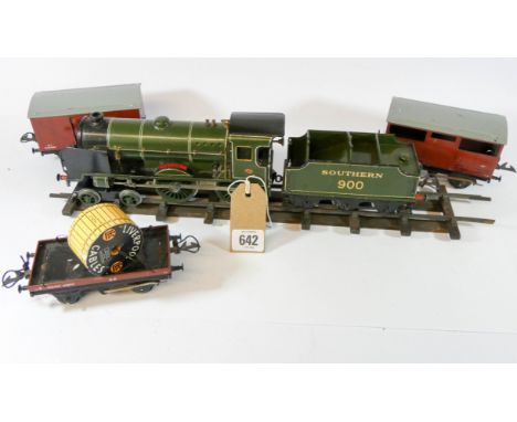 The Hornby 0 gauge Southern Railway Engine Eaton complete with its tender, various goods trucks and a quantity of railway tra