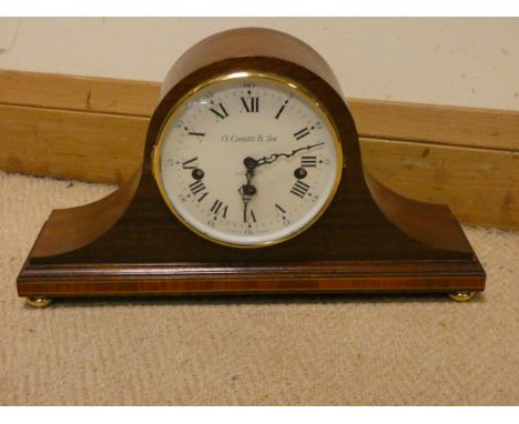 A Westminster chiming mantel clock by O Comitti &amp; Son London, in Napoleon style mahogany case 
