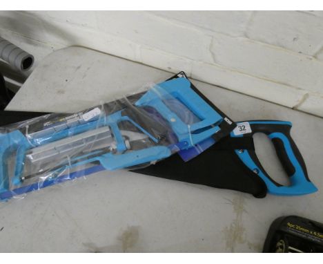 A new Stay Sharp hand saw and a new 4 piece hacksaw set 