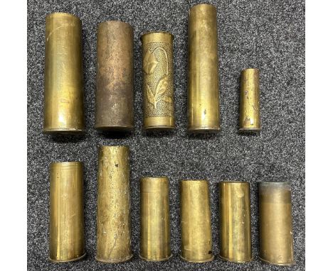 WW2 British 25 Prd &amp; one 6 Prd A/T Shell Case, one 75mm Trench Art case, WW1 German 77mm shell case dated 1914, WW1 Briti