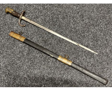 French Gras Bayonet with single edged blade maker marked and dated "St. Etienne 1878" 520mm in length. Wooden grips, working 