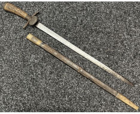 Hunting Cutlass with 473mm long blade, no makers mark. Clamshell guard. Horn grip. Overall length 610mm. Complete with leathe
