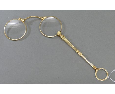 Lorgnette14 kt. Gelbgold, punziert, aufklappbar, um 1900, l 15 cm, Bruttogewicht 31g, 