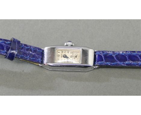 DamenarmbanduhrMetallgehäuse, "Odeon", cremefarbenes Zifferblatt, Handaufzug, Art Deco, blaues Lederband, dezentrale Sekunde,