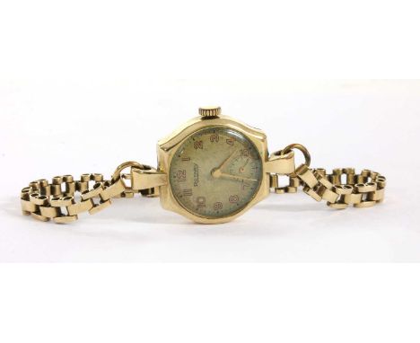 A ladies' 9ct gold Rotary mechanical bracelet watch, circular dial with Arabic numerals and subsidiary seconds dial, with Den
