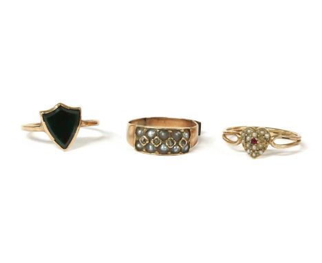 Three gold rings, to include a shield shaped bloodstone tablet, rub set, to round section shank, tested as approximately 9ct 