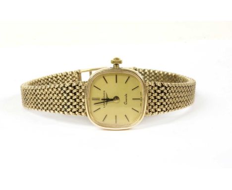 A ladies' 9ct gold Longines quartz bracelet watch, cushion shaped 20mm diameter with champagne dial and raised baton hour mar