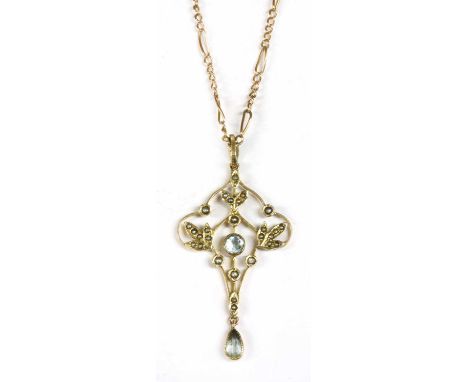 An Edwardian gold aquamarine and split pearl pendant, the whiplash frame with a circular mixed cut aquamarine milligrain set 