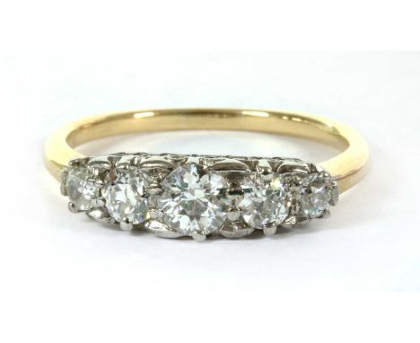 A gold five stone diamond ring, a row of graduated old European cut diamonds, estimated as approximately 0.80ct total, claw s