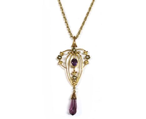 An Edwardian gold amethyst and split pearl pendant, a whiplash frame with an oval mixed cut amethyst rub set to a plain frame