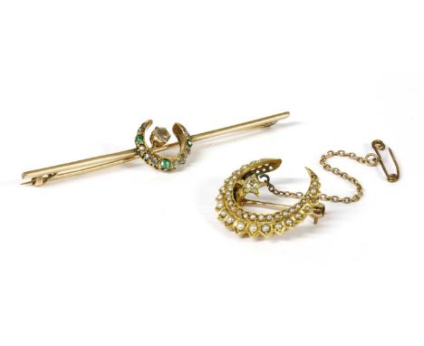 A gold diamond and emerald crescent bar brooch, a graduated row of mixed cut diamonds and emeralds claw set to the crescent, 