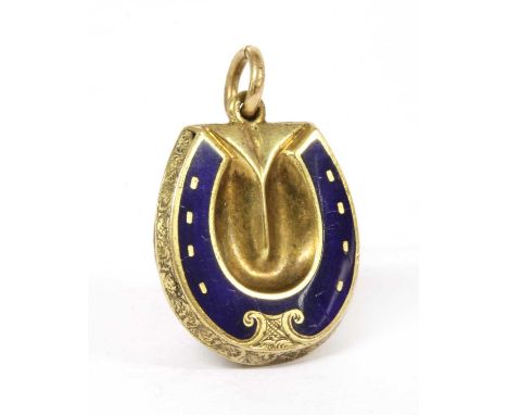 A gold enamel horseshoe locket, royal blue champlevé enamel horseshoe to the front, with engraved sides and back, the hinged 