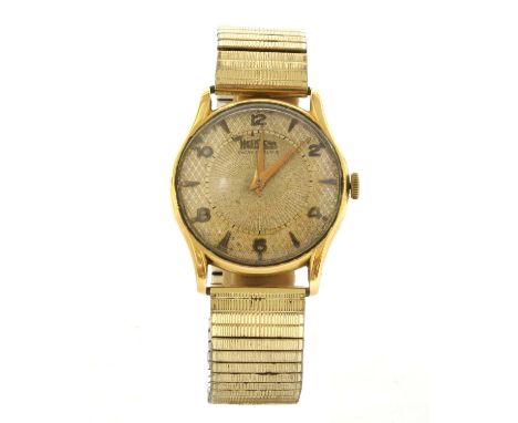 A gentlemen's gold Herodia mechanical bracelet watch, 34mm diameter, with engine turned dial, alternating Arabic numerals and