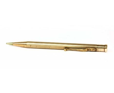 A 9ct gold Yard-O-Led propelling pencil, with engine turned decoration and cartouche with hand engraved initials 'N.C.H.', cl