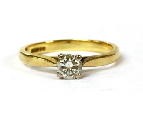 An 18ct gold single stone diamond ring, with a brilliant cut diamond, estimated as approximately 0.30ct, claw set in white go