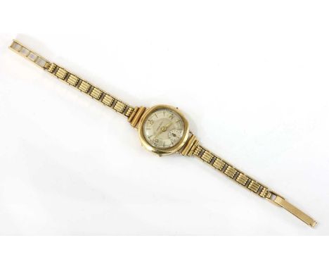 A ladies' 9ct gold mechanical bracelet watch, 22mm diameter with a silvered dial marked 'EBAUCHE SUISSE', Arabic numerals and