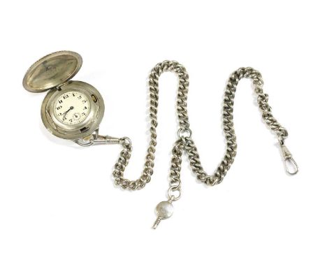 A French sterling silver Marvin pocket/pendant watch, 41mm diameter with dimpled case, movement hinged to the interior case, 