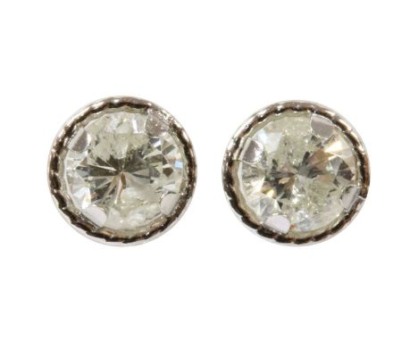 A pair of white gold diamond stud earrings, a brilliant cut diamond, with a total estimated weight of approximately 0.46ct, c