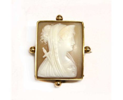 A rectangular gold shell cameo brooch, possibly depicting Athena with the head of Medusa on her breastplate, in white to a ve