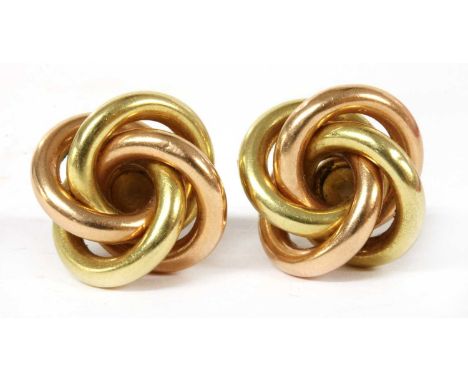 A pair of gold and rose gold knot stud earrings, the four wire knot to post and scroll fittings, tested as approximately 14ct