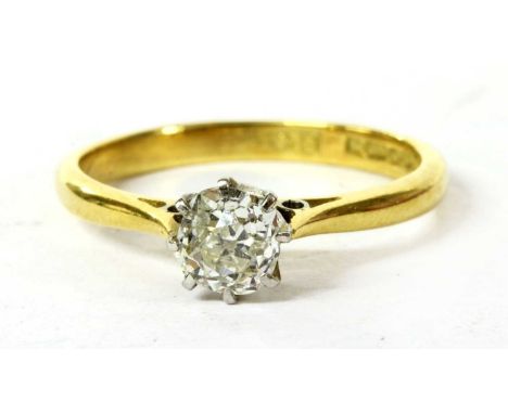 An 18ct gold single stone diamond ring, an old brilliant cut diamond, estimated as approximately 0.45ct, claw set to a white 