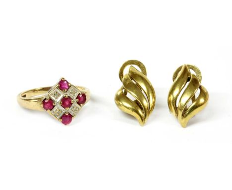 A 9ct gold ruby and diamond ring, a cinquefoil of circular mixed cut rubies, claw set to the off-set square head, with eight 