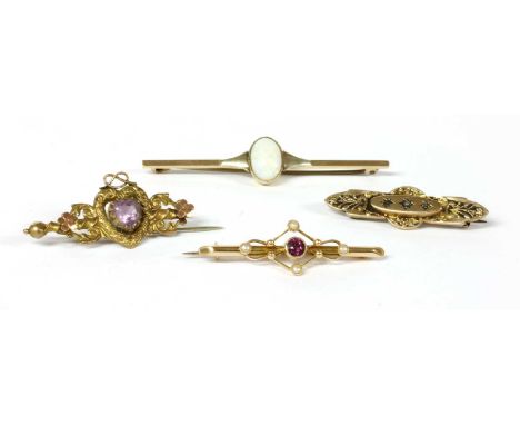 A gold garnet and split pearl bar brooch, with pin and 'C' catch, tested as approximately 15ct gold, with 9ct gold pin, 42mm 