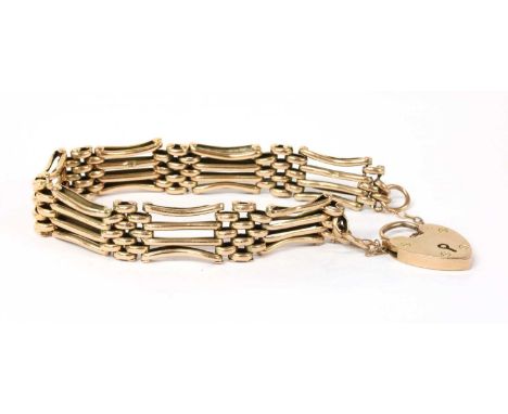 A gold gate link bracelet, with bowed outer bars, safety chain and heart shaped padlock clasp, marked 9ct, 17.42gCondition re