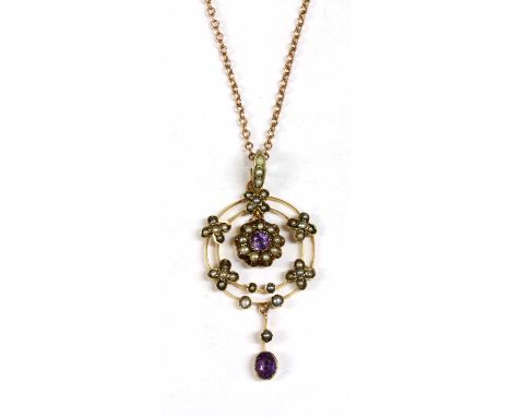 A gold amethyst and split pearl pendant, an amehyst and split pearl cluster to the centre, to openwork circular frame with sp