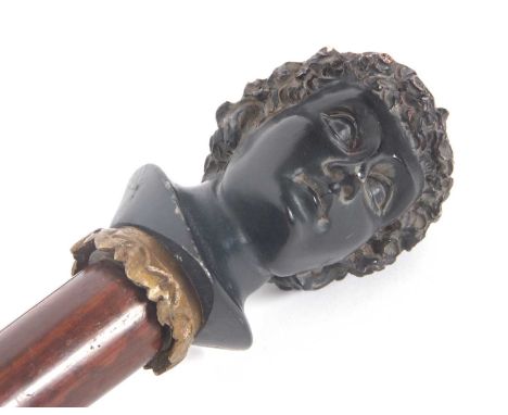 A vintage walking stick with painted resin Bacchanalian bust of a gentleman, the hardwood shaft drilled with an eyelet for ca