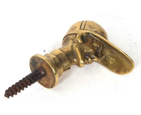 An antique brass cast jockeys head walking stick screw in handle, 9cm long