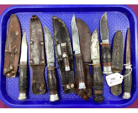 A Collection of Hunting Knives, including William Rodgers, Wade &amp; Butcher, (rust), sheaths.