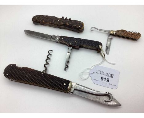 A Single Blade Folding Knife, blade stamped "Joseph Rodgers &amp; Sons", with button hook and corkscrew (11.2cm closed); A Tw