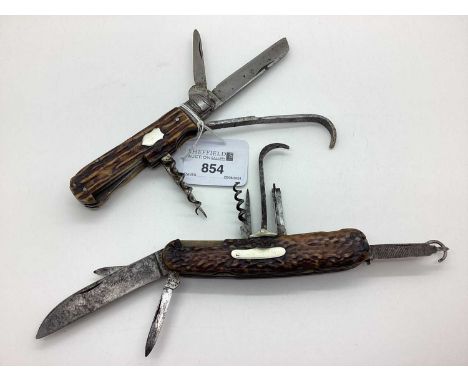 A Combination Multi Tool Folding Pocket Knife, one blade stamped "Dewsnap", another indistinctly stamped "G.. Bristol" (11.3c