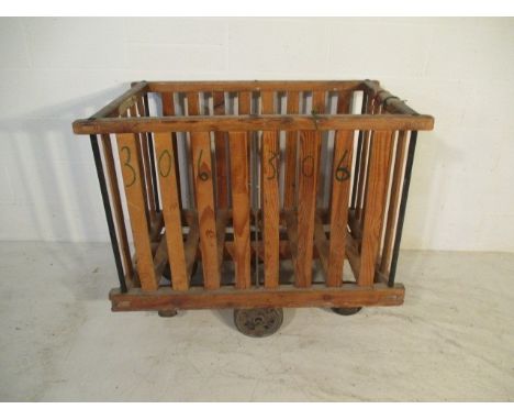 A slatted wooden bobbin trolley, 108 cm x 69 cm