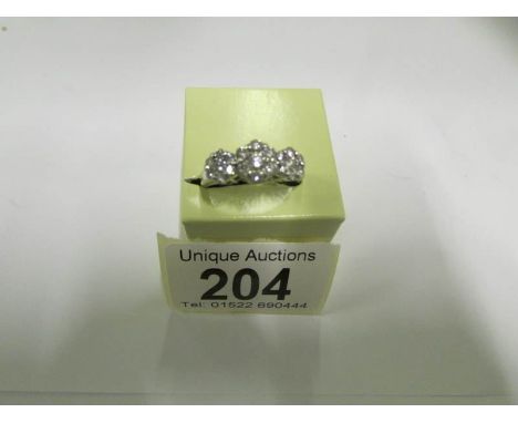 A 14kt white gold 1ct plus 3 floral diamond ring, size R