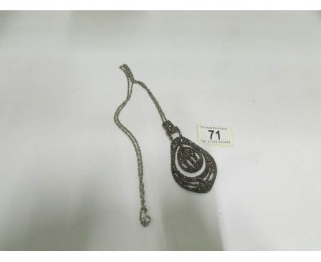 A vintage cut steel pendant