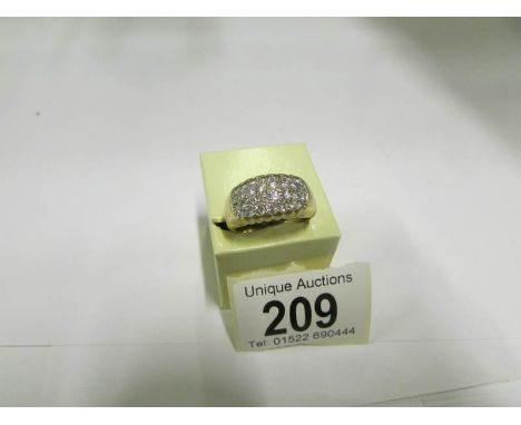 An 18ct yellow gold 32 stone diamond ring, size R