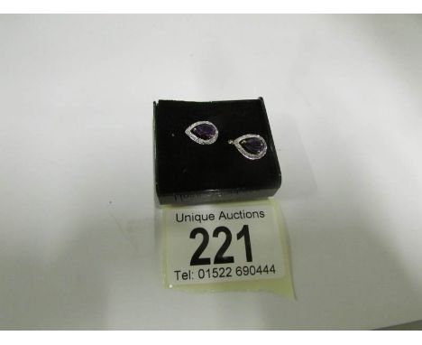 A pair of yellow gold diamond and amethyst earrings