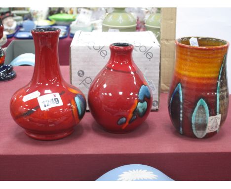 Poole Pottery Living Glaze Vase, circa 2000, with abstract diagonal band on red ground, 12.5cm high, boxed; another bulbous s