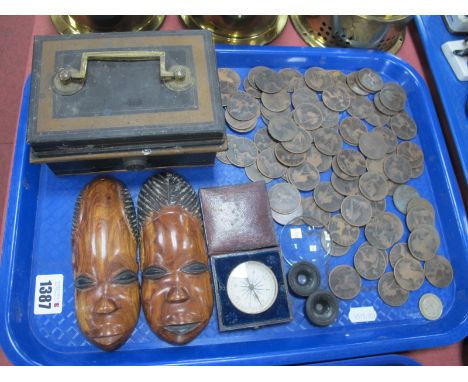 A Cash Box, quantity of pennies, shilling, compass in Morocco casing, wall masks, etc:- One Tray.