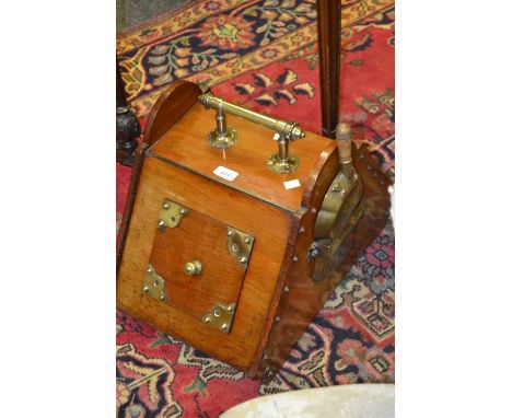 A Victorian mahogany and brass perdonium, brass escutcheons; an early twentieth century brass planter (2)