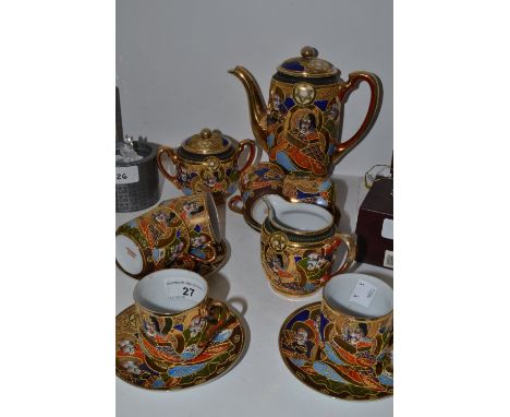 A Japanese eggshell tea service , hand painted with Samurai warriors 