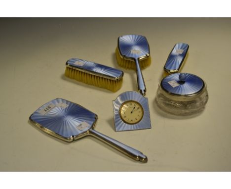 A silver and guilloché enamel dressing table set , Chester 1938, comprising of a powder bowl, hand mirror, clothes brushes, h