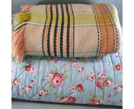 Cotton vintage rose print quilt with paisley rose pattern to reverse, together with a vintage woollen check blanket or carthe