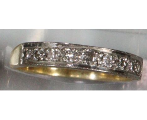 18ct gold nine stone diamond ring.  3.1g approx.  Size P.   (B.P. 21% + VAT) 