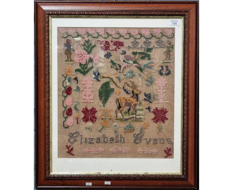 Welsh tapestry sampler by Elizabeth Evans, probably 19th century.  49x43cm approx.  Framed and glazed.   (B.P. 21% + VAT) 