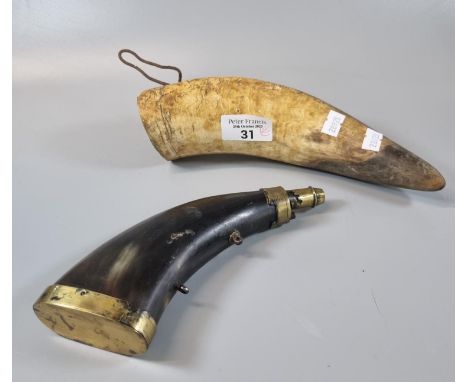 Rustic bull's horn type flask together with another metal mounted horn shaped flask with brass dispenser (AF).  (2)  (B.P. 21
